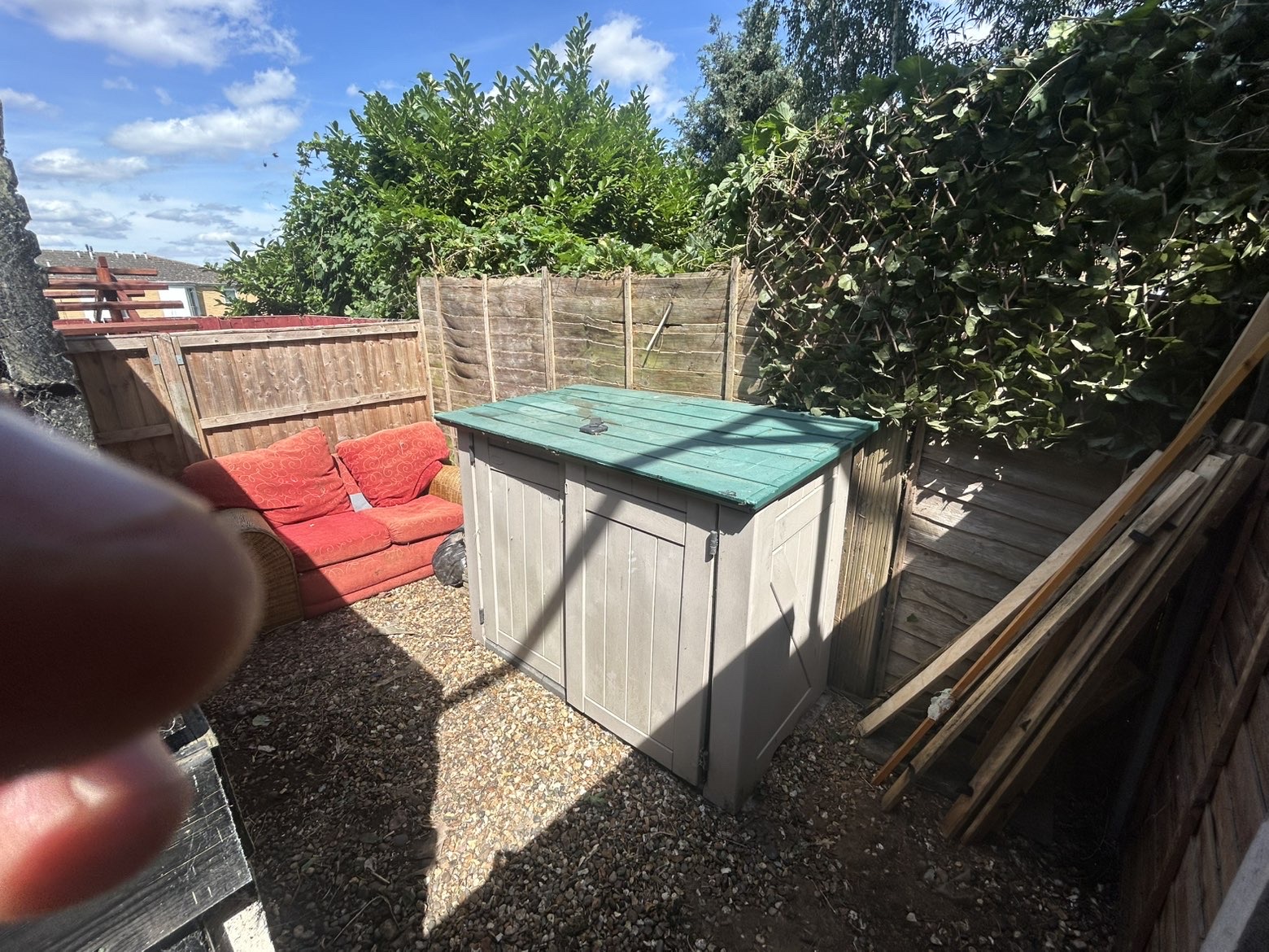 Same corner cleared, tidy with visible fencing and gravel