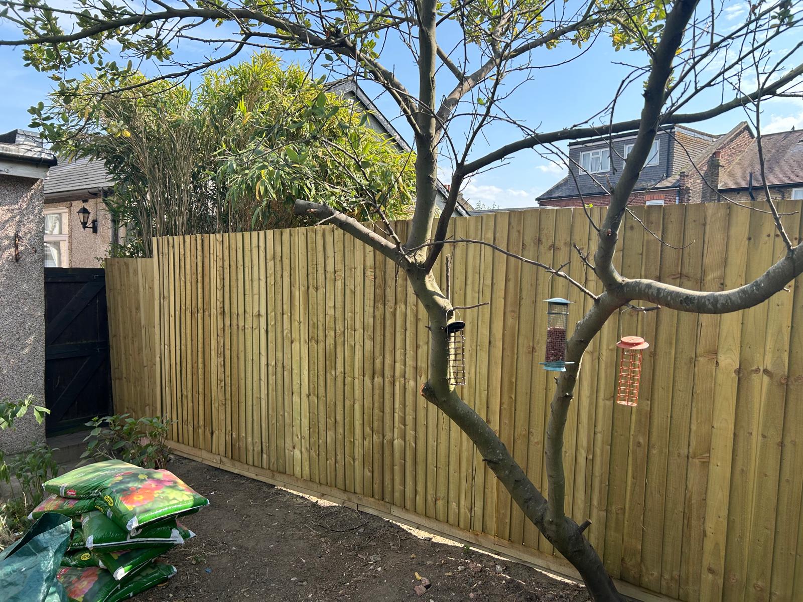 New timber fence installed along the tidied boundary