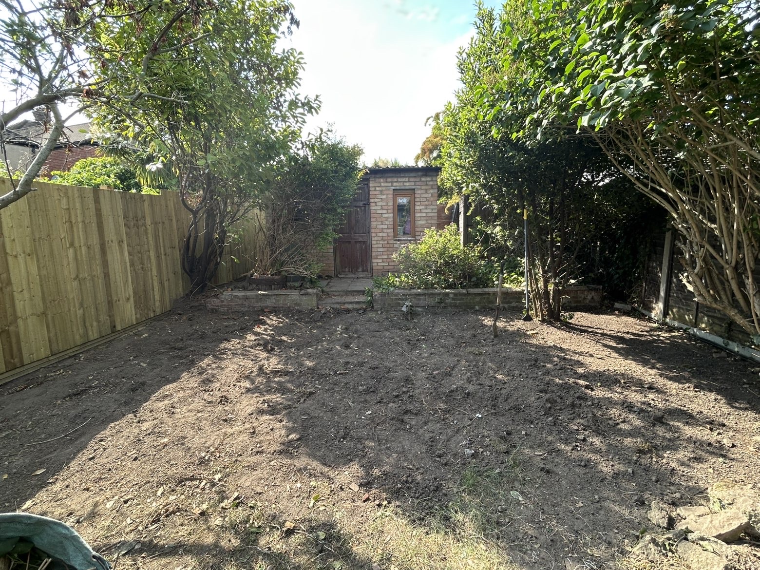 Bare, dug-over garden before landscaping